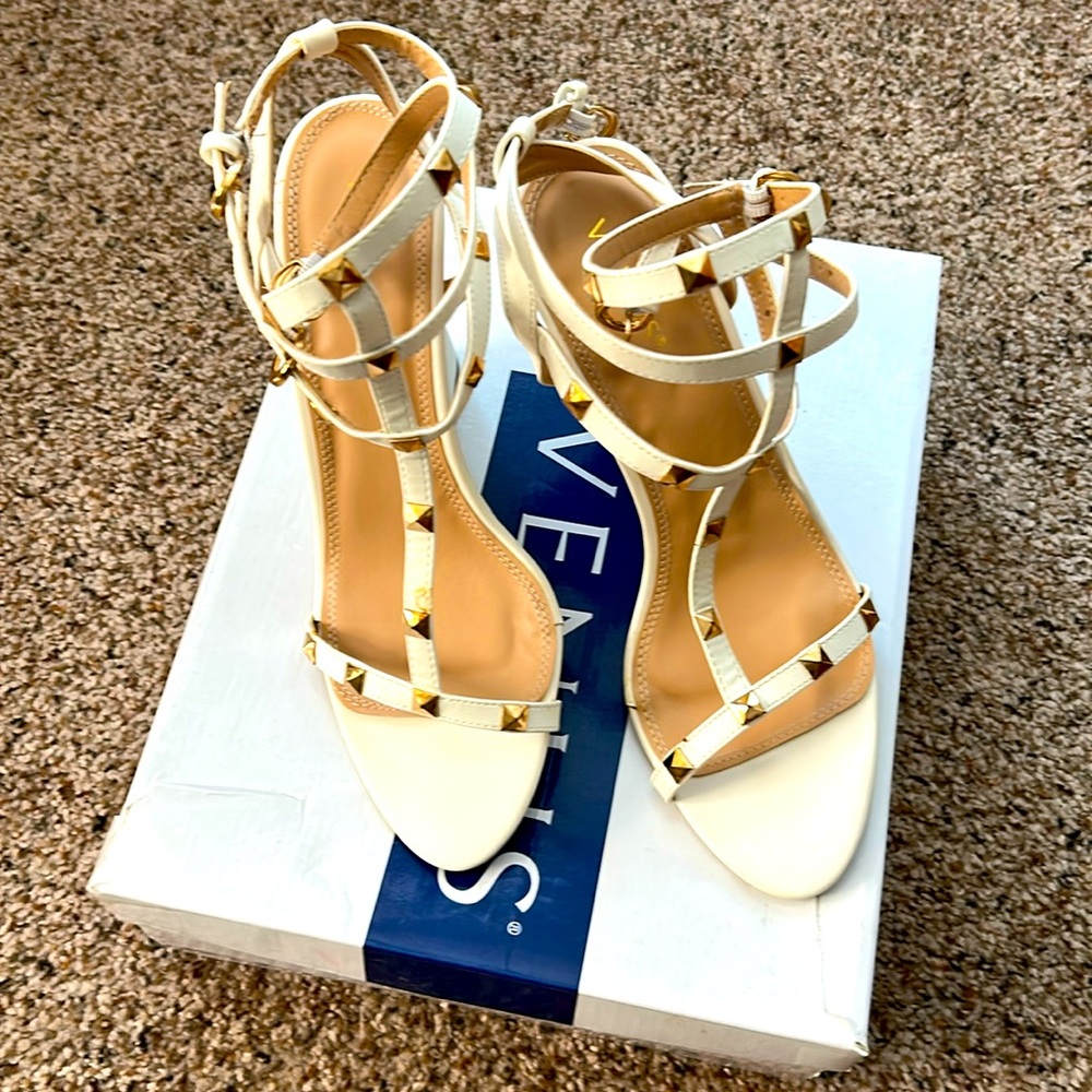 Venus wedged heeled sandle. The strap buckle above the ankle looks very cute.